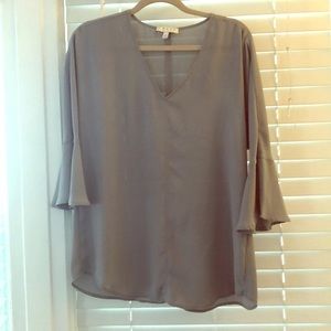Gray flowy top with bell sleeves
